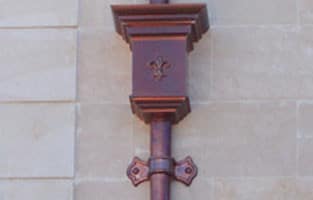 Napolean Leader Head with Bow Tie Downspout Strap
