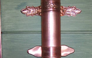 Copper Metco Fleur de Lis and Leaf Downspout Bracket