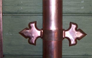 Cast Copper Fleur de Lis on Standard Downspout Strap