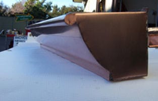 Copper Quarter Round Gutter with a Flat Bottom