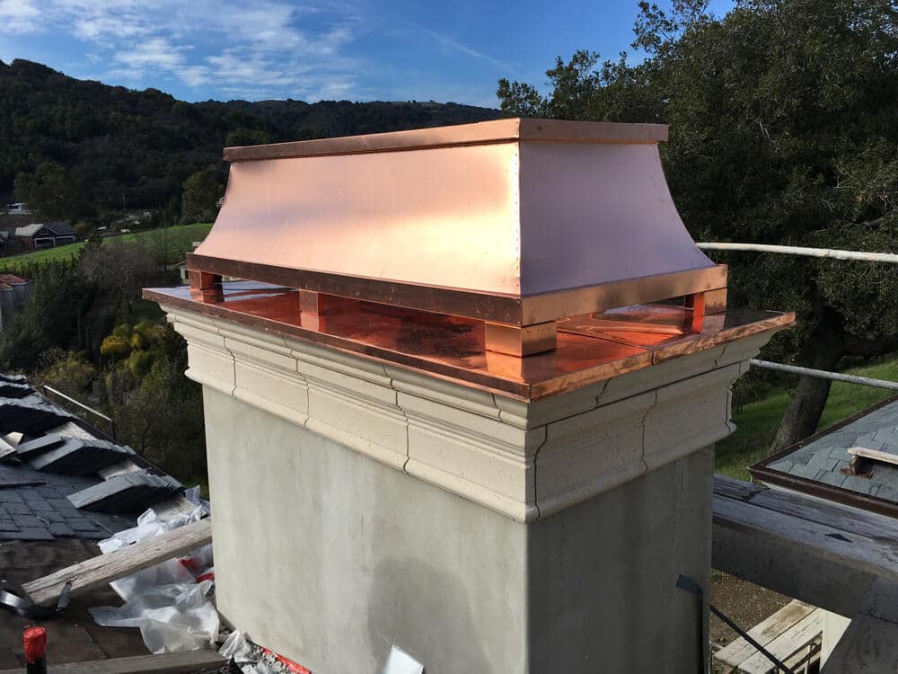 custom copper chimney cap installed