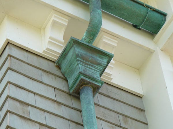 patina on copper gutter leaderhead and downspout pearl city oahu hawaii